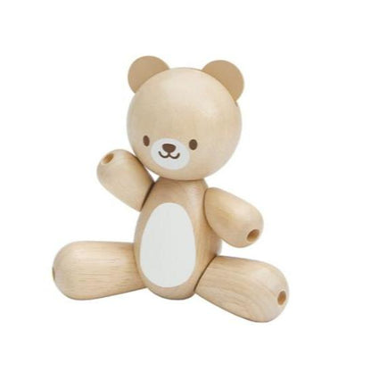 Bear Clutching Toy